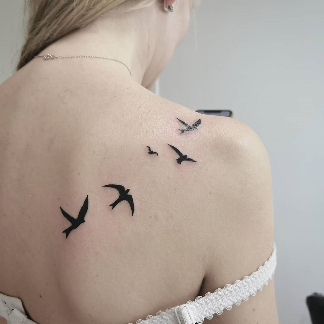 flying birds tattoo