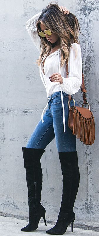 black knee high boots with white jeans