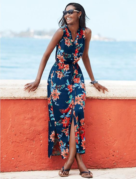 An uncomplicated maxi dress in a bold tropical flower print. Pair with sun-kissed skin.