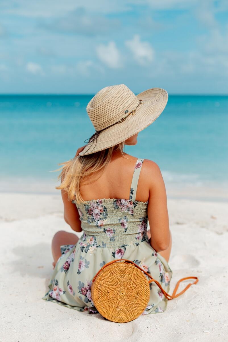 Wear a beach hat to protect skin