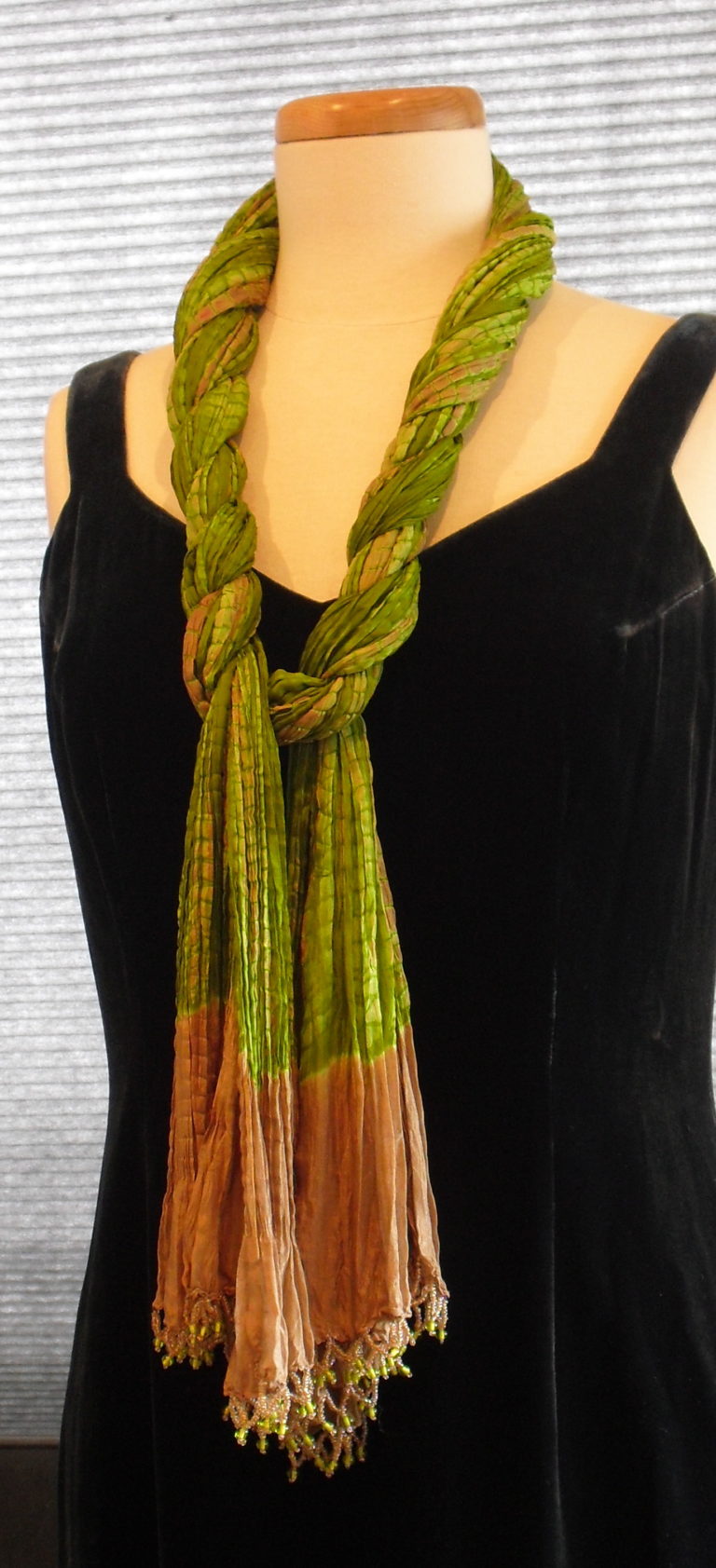 Twisted Way To Tie A Scarf 768x1683 1 How to Tie a Scarf to Jazz Up Your Hair, Neckline, Waist & Bag Handles