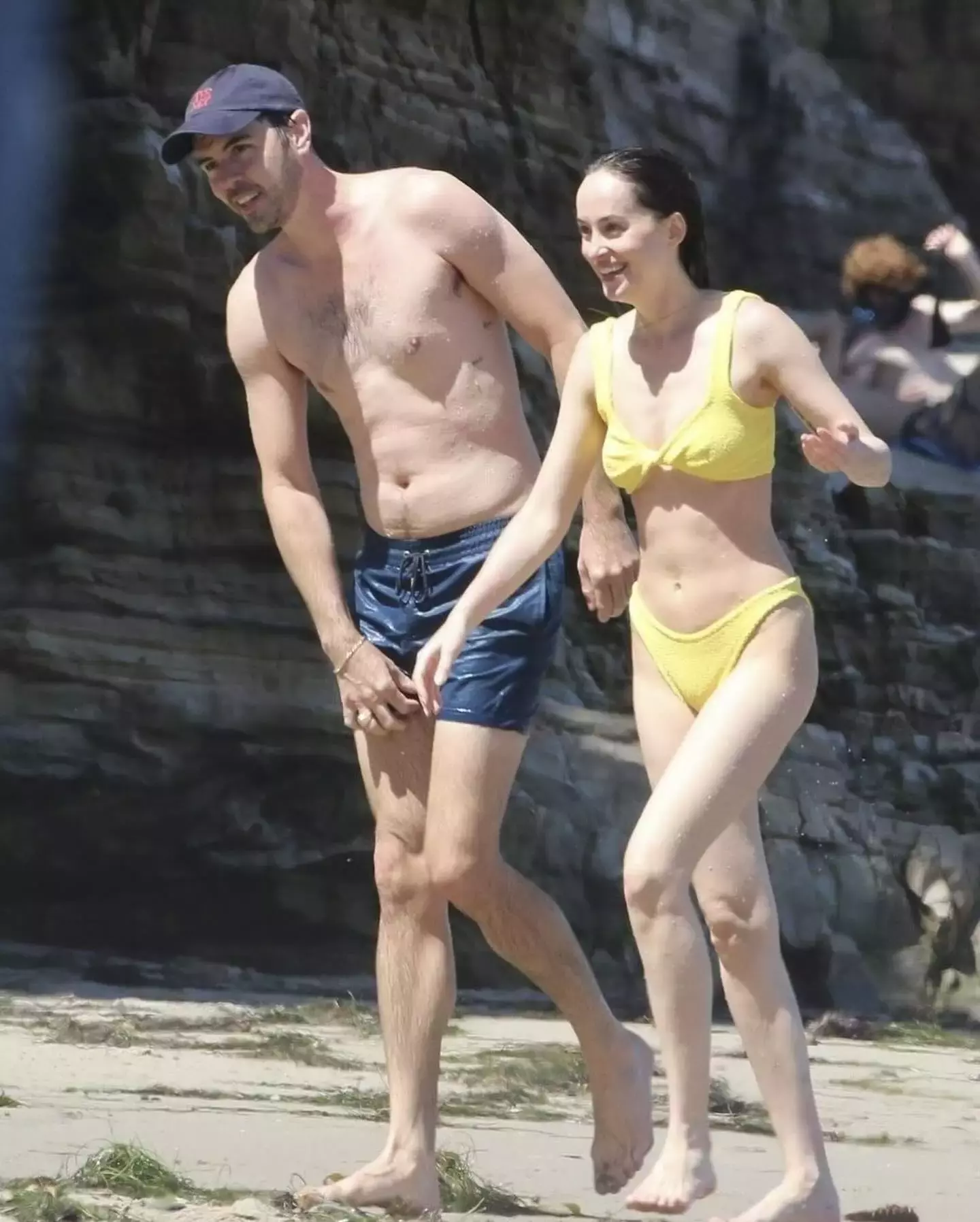 Dakota Johnson Enjoys Malibu Beach In Stylish Hunza G Bikini