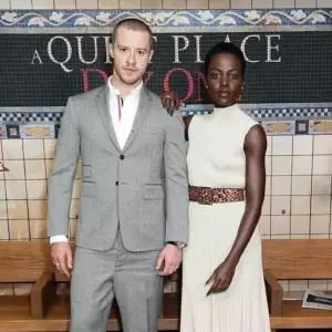 Lupita Nyongo Dazzles In Meem Dress And Banana Republic Belt