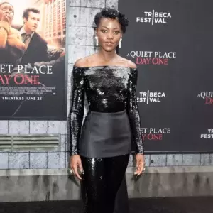 Lupita Nyongo Rocks In Custom Prada Catsuit