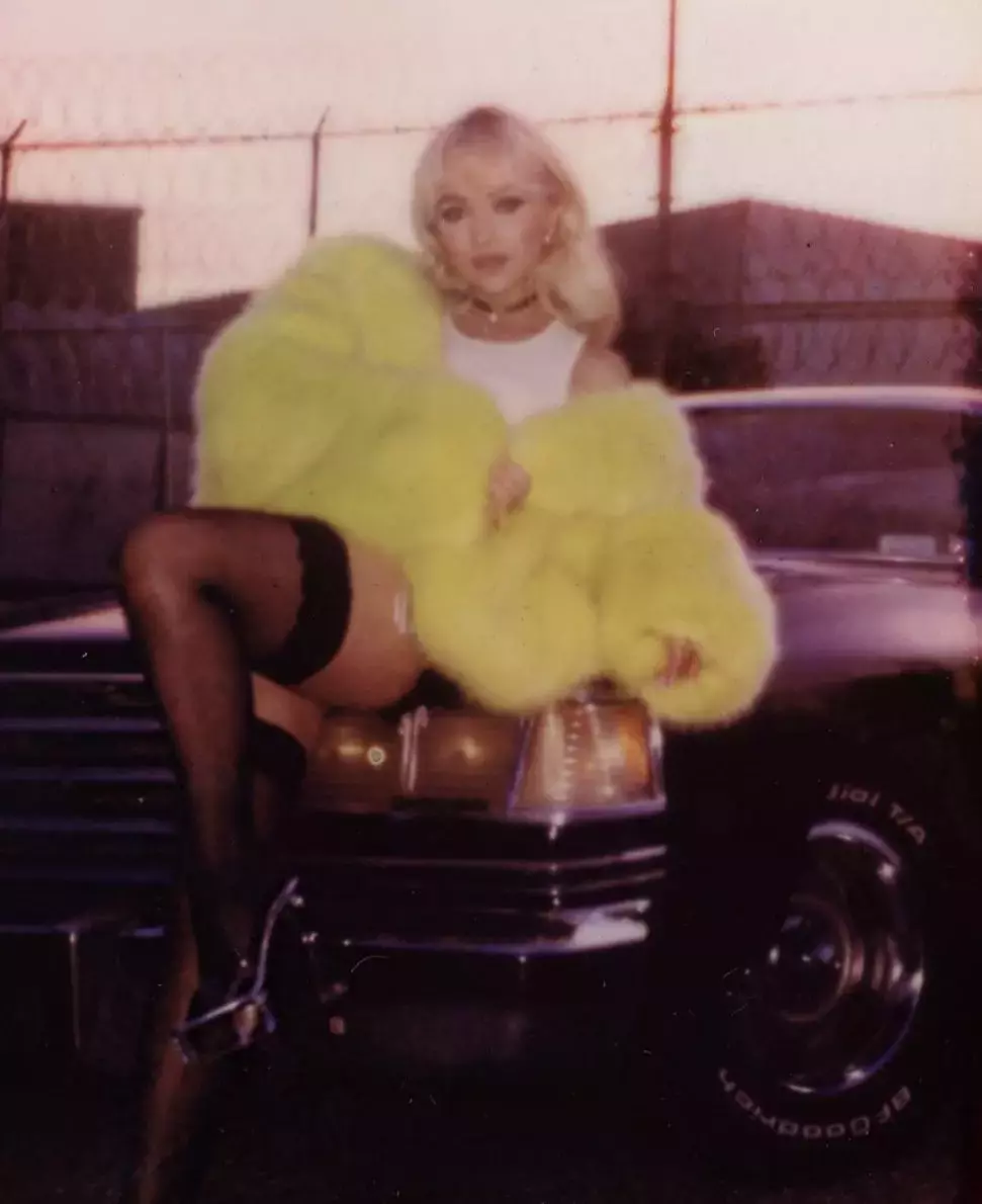 Sabrina Carpenter Yellow Fur Coat