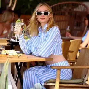Sophie Turner Outfit Stripe Shirt Adidas Sneakers 3