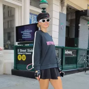 paris hilton dazzles nyc in chic a line miniskirt and over the knee louboutins